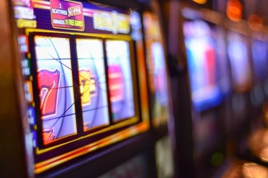 Wild Coaster slot game interface showing reels, symbols, and payout table